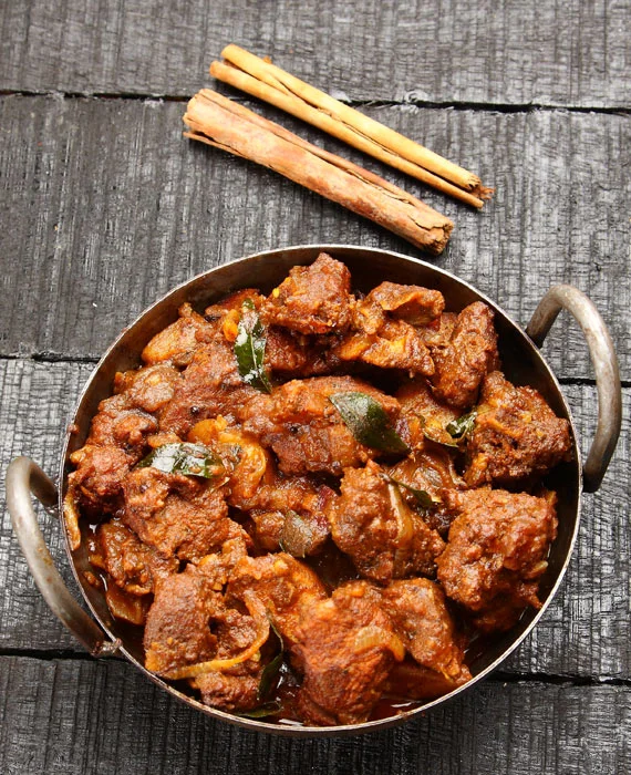 Curry Lamb with Tomatoes, Pine Nuts & Raisins